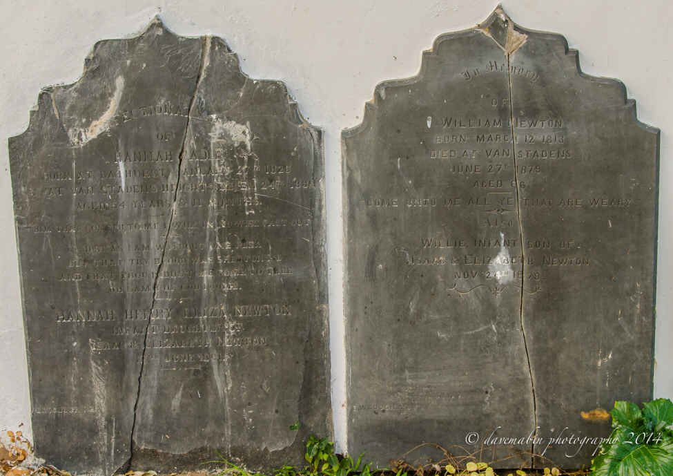 2. The gravestones propped up against the wall