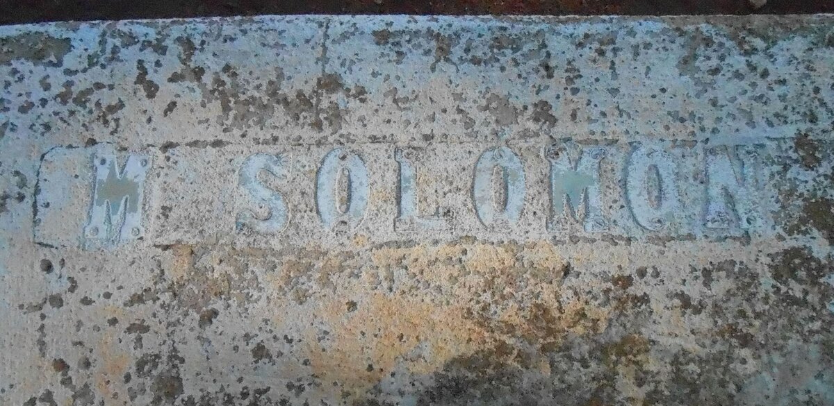 SOLOMON M.